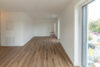 Erstbezug in hochwertiger Wohnung mit Balkon und Bergblick - Neue Einbauküche inklusive - Wohnbereich