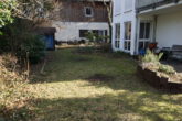 Gut vermietete Gartenwohnung mit Tiefgarage in ruhiger Haarer Wohnlage zu verkaufen EG + Souterrain - Bild