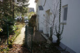 Gut vermietete Gartenwohnung mit Tiefgarage in ruhiger Haarer Wohnlage zu verkaufen EG + Souterrain - zur Straße