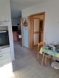 Neuwertige Erdgeschoßwohnung mit kleinem Garten und Garage, demnächst frei werdend in schöner Lage. - Bild