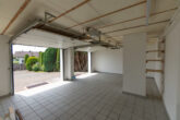 Gemütliche Wohnung im Obergeschoss mit großer Dachterrasse und Garten in schönem Zweiparteienhaus - Garage